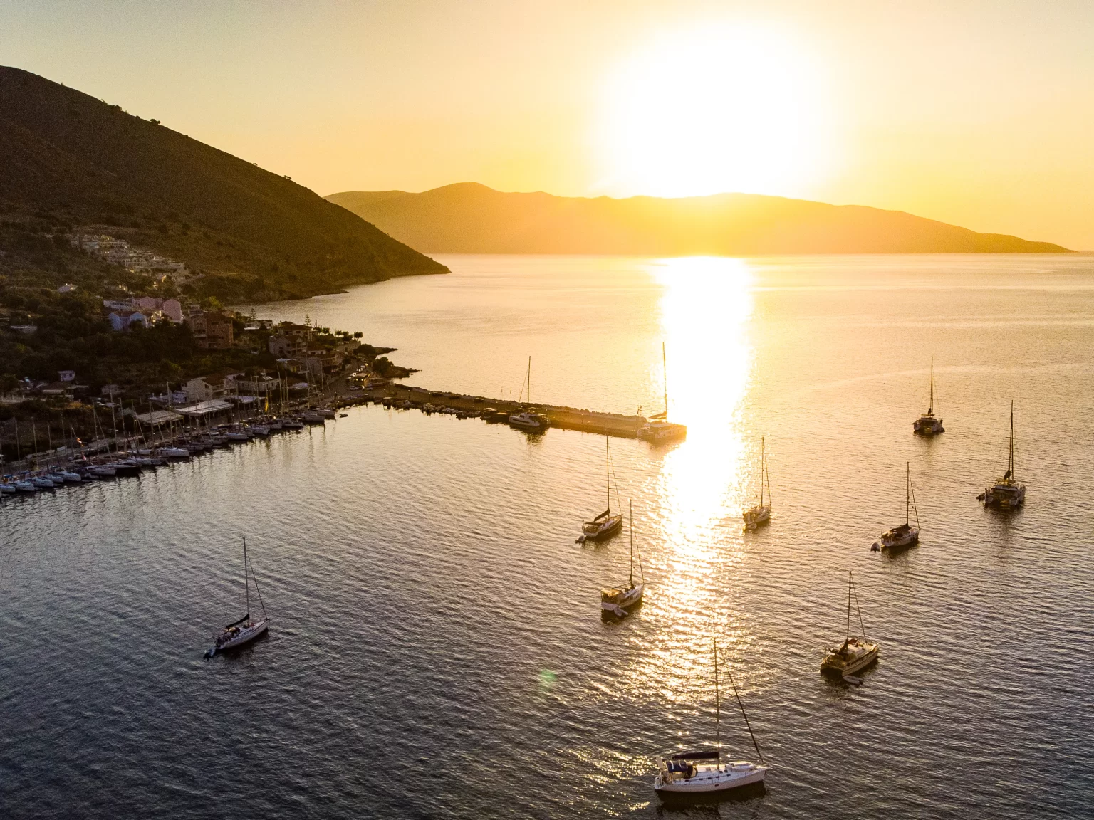 Yachts at anchor off Agia Efimia, Kefalonia, at sunset