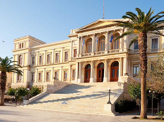 Government buildings and the square in the Greek town on the island of Syros