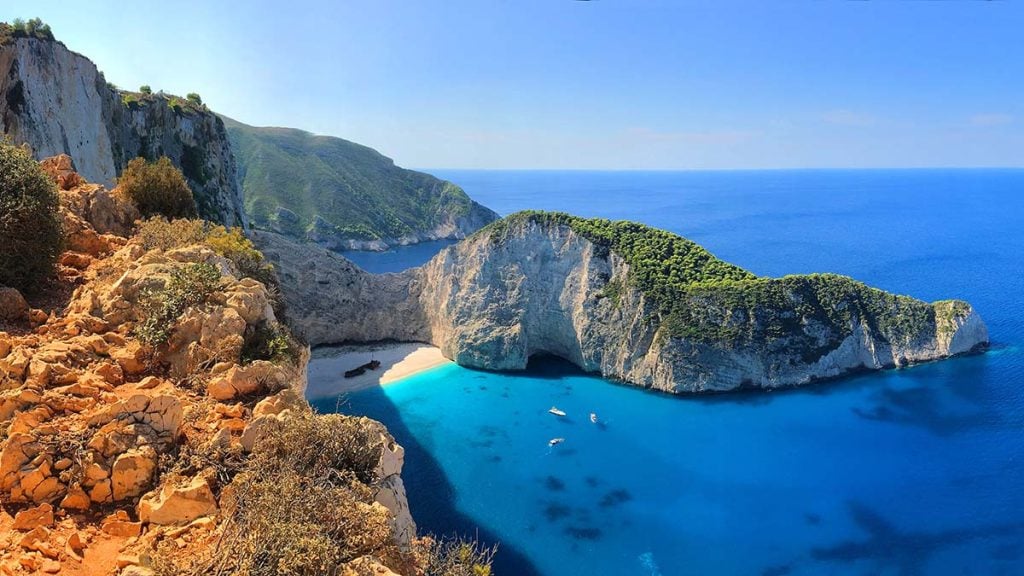 Amazing Navagio Beach or Shipwreck beach in summer. Zakynthos or Zante island, Ionian Sea, Greece.