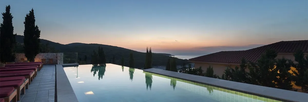 Swimming pool in hotel overlooking ionian sea