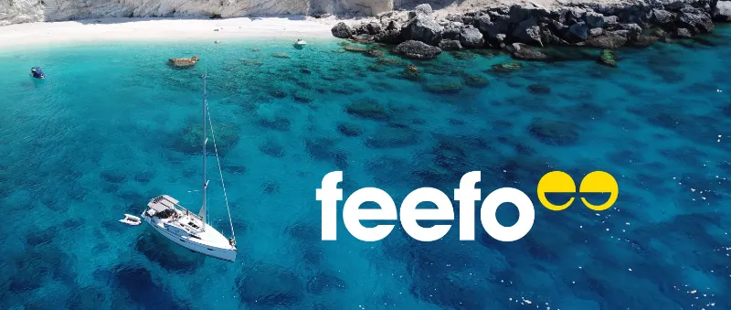 Yacht in stunning bay with feefo logo