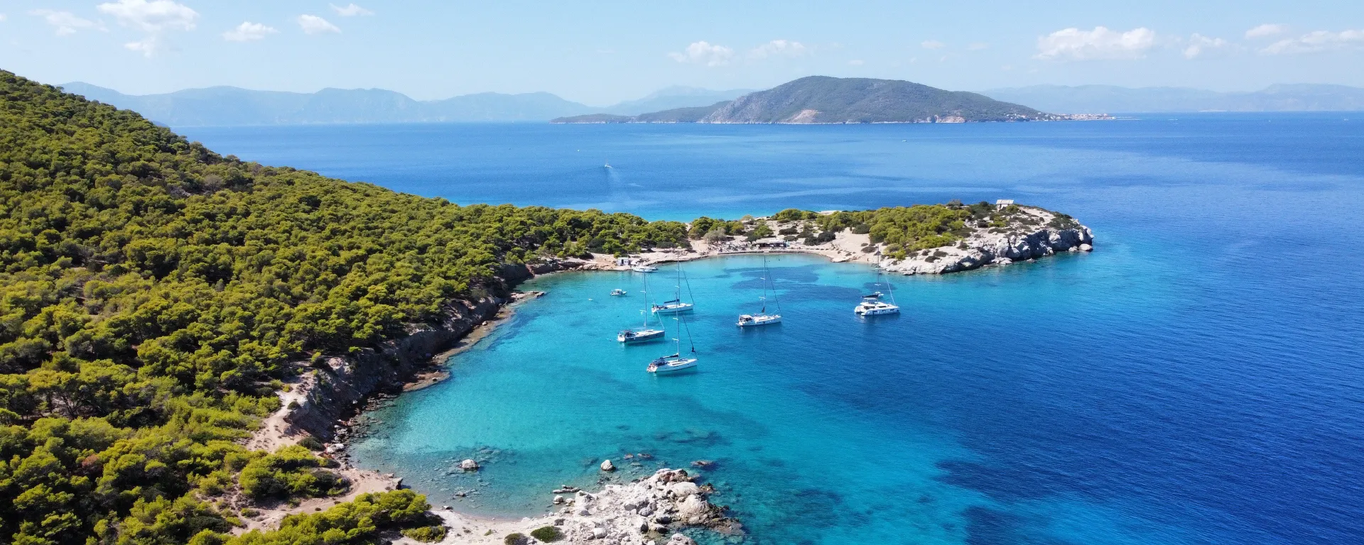 Yachts anchored off Moni island in the Saronic Gulf