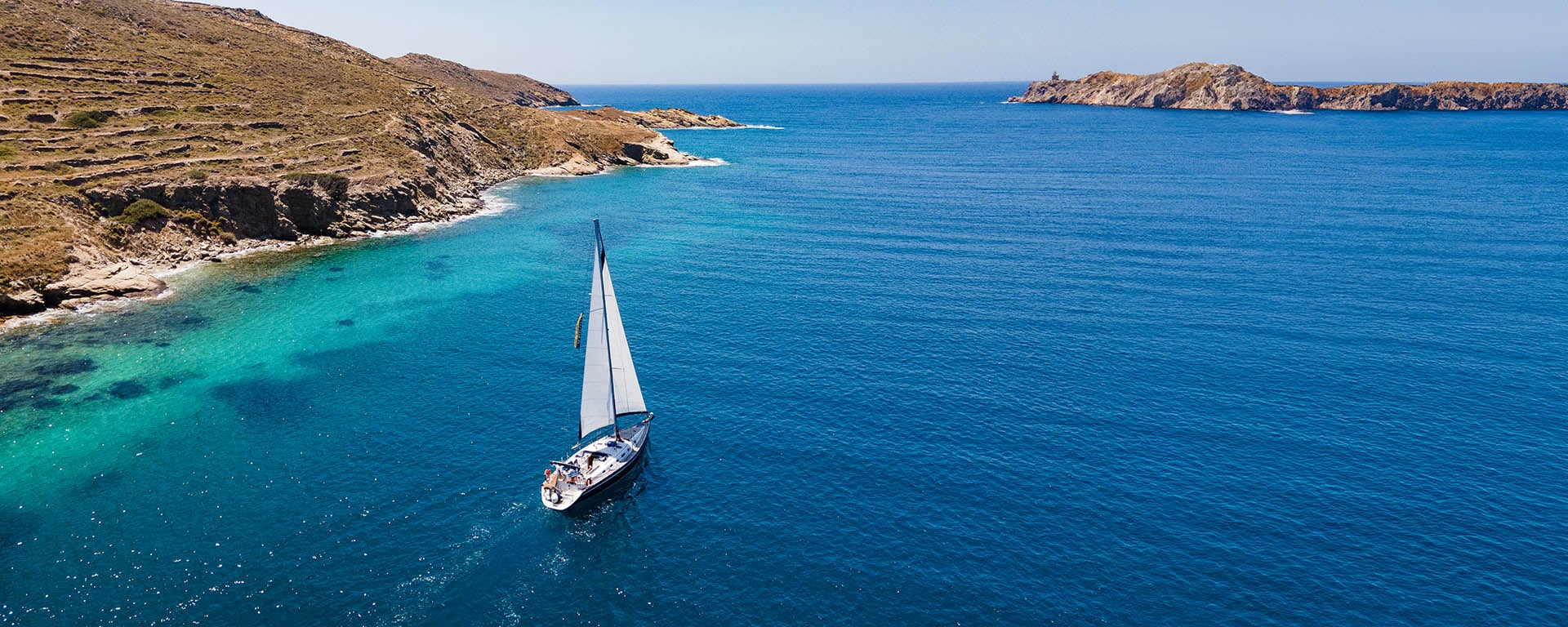 An Ocean Star 51.1 sailing in turquoise water off Ios in the Cyclades