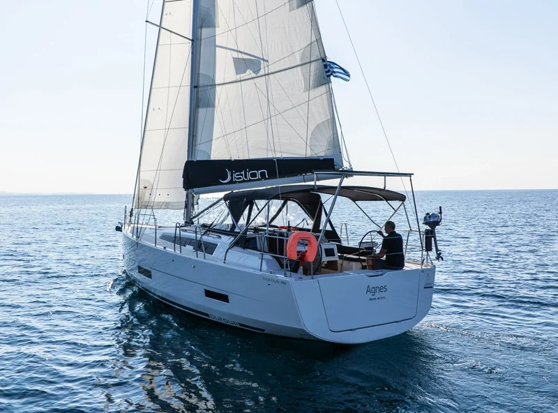 The stern and cockpit of a Dufour 390 Grand Large under sail