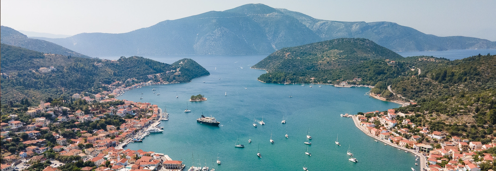 Aerial view of Vathi harbour on Ithaca, the first stop of the delivery flotilla
