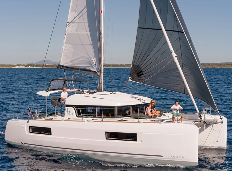 Guests relaxing on a Lagoon 40 catamaran under sail