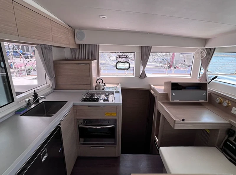 Galley with cooker, fridge and worktop