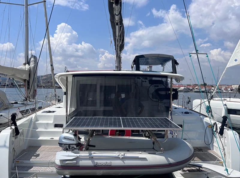 The aft cockpit and solar panels of a Lagoon 40 catamaran