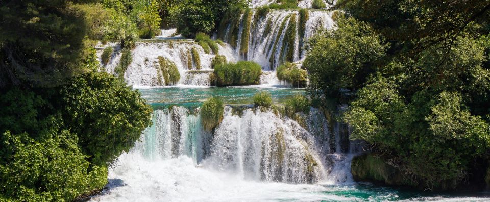 The breathtaking Krka waterfalls in Dalmatian national parks, with cascading water and lush green surroundings