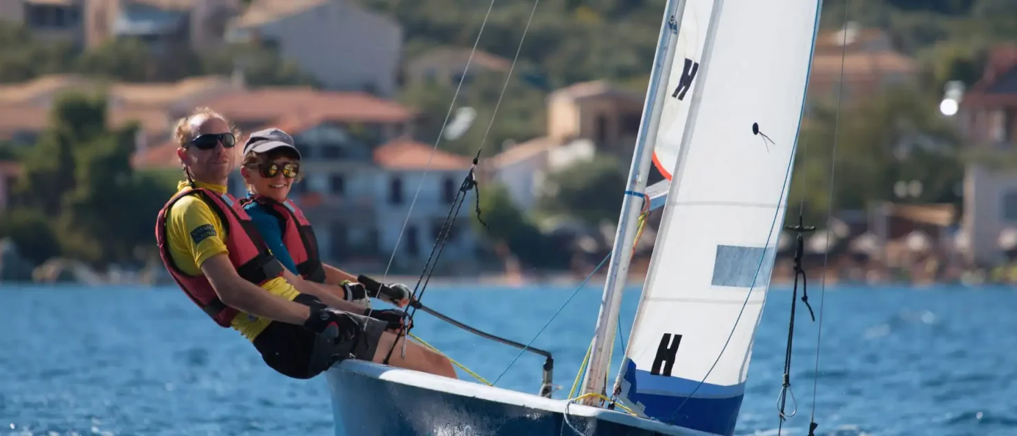 Instructor and student enjoying dinghy sailing sessions at Seafarer Academy in Greece