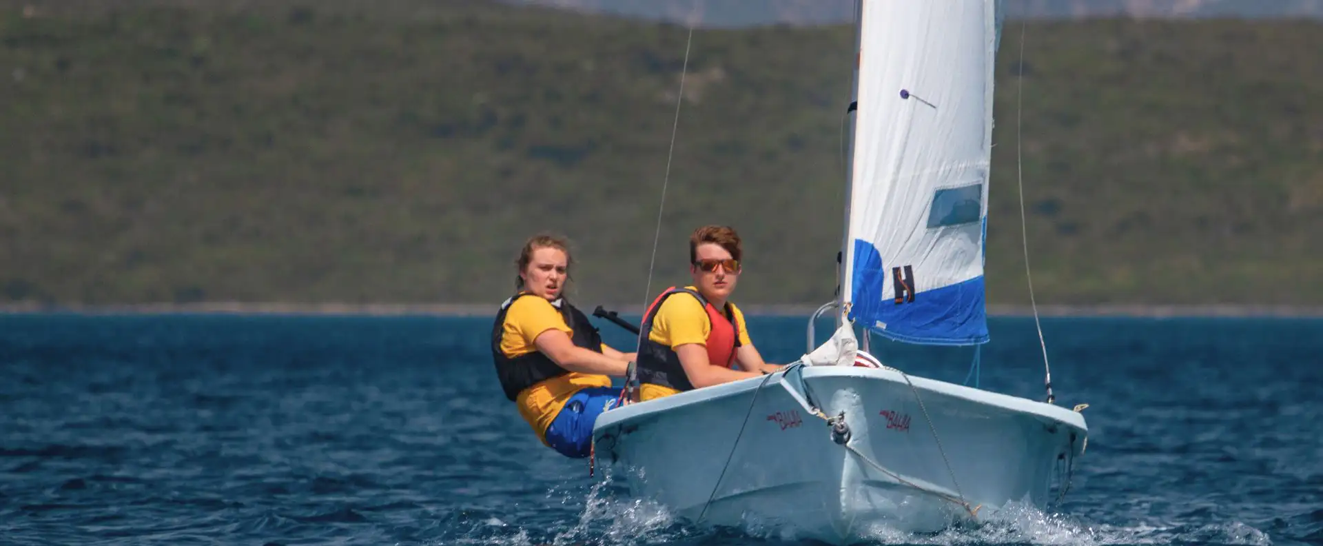 Two sailing students practicing during the dinghy sailing instructor course at Seafarer Academy in Lefkas