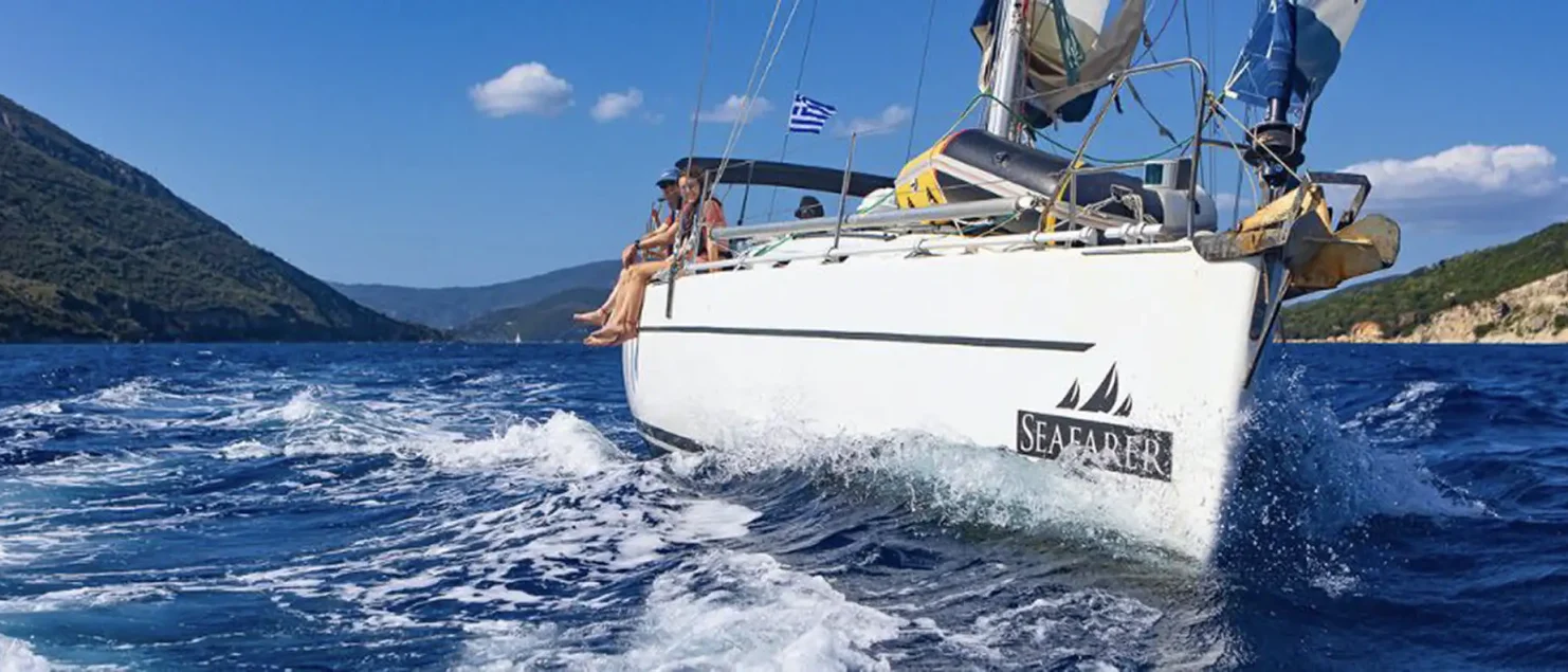 Seafarer yacht sailing in Greece with guests enjoying the open water