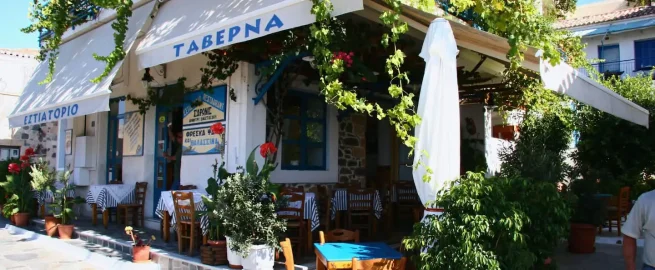 A Greek taverna with a vine-covered terrace