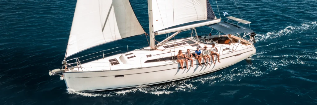 AHOY guests on deck as the Bavaria 51 sails in the Ionian