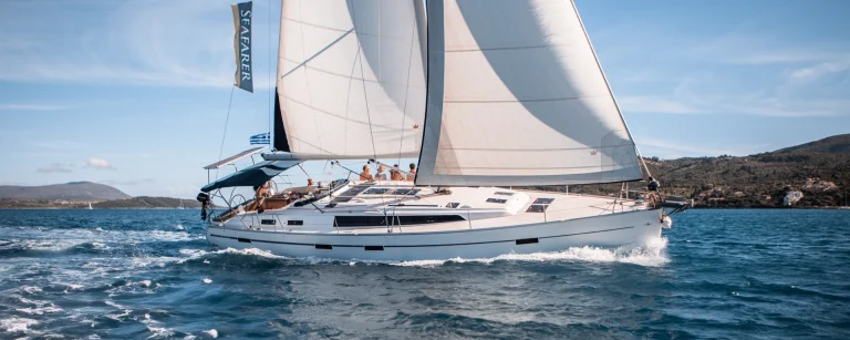 Guests on deck of an AHOY Bavaria 51 sailing yacht in the Ionian