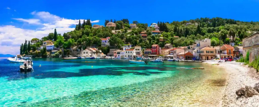 Paxos Lakka harbour with clear water and small boats, Ionian Greece