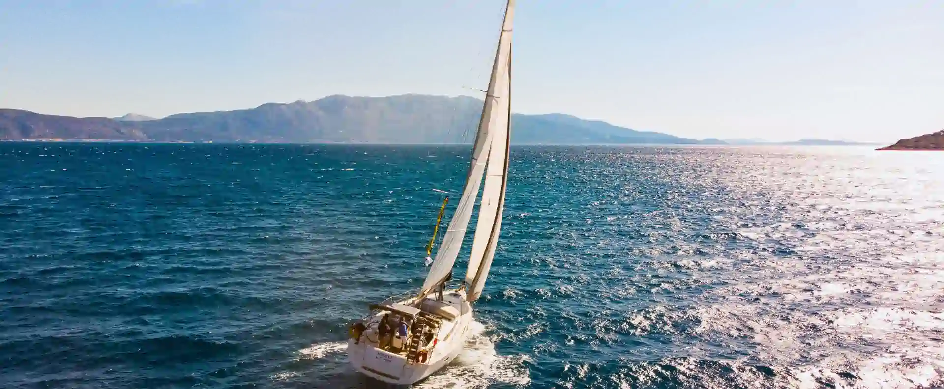 Sun Odyssey 469 under sail in the Ionian near Lefkas on a milebuilder sailing week