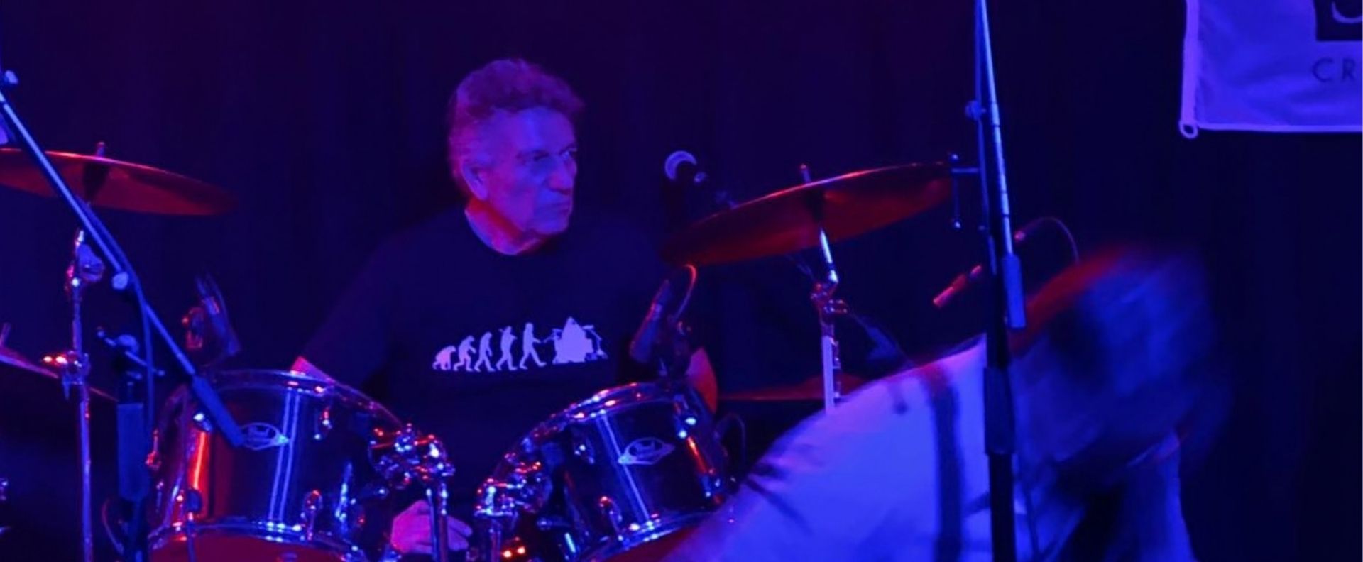 Chris Lorenzo performing on drums during the Seafarer 30th Anniversary celebration at The Water Rats.