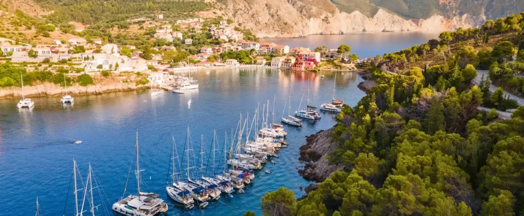 Charity auction holiday in Kefalonia showing yachts moored in a sheltered Greek bay