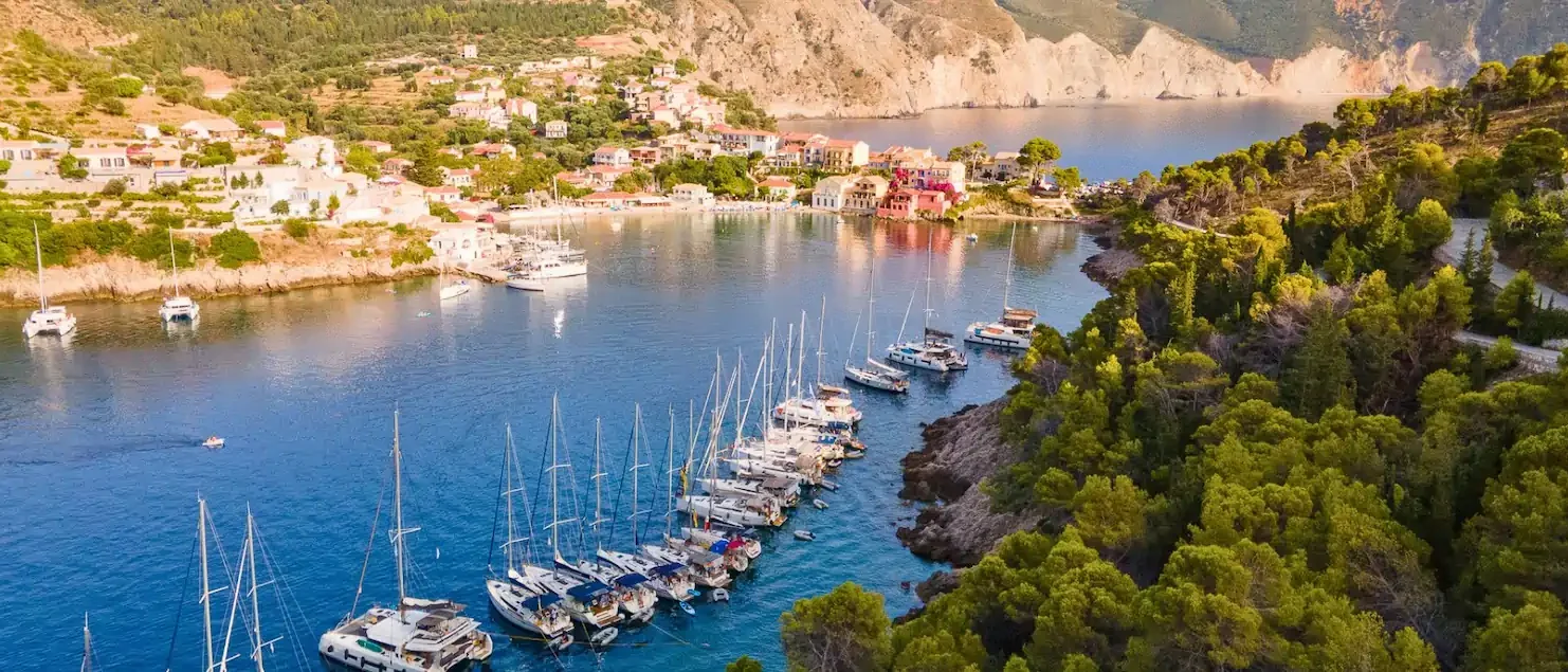 Charity auction holiday in Kefalonia showing yachts moored in a sheltered Greek bay