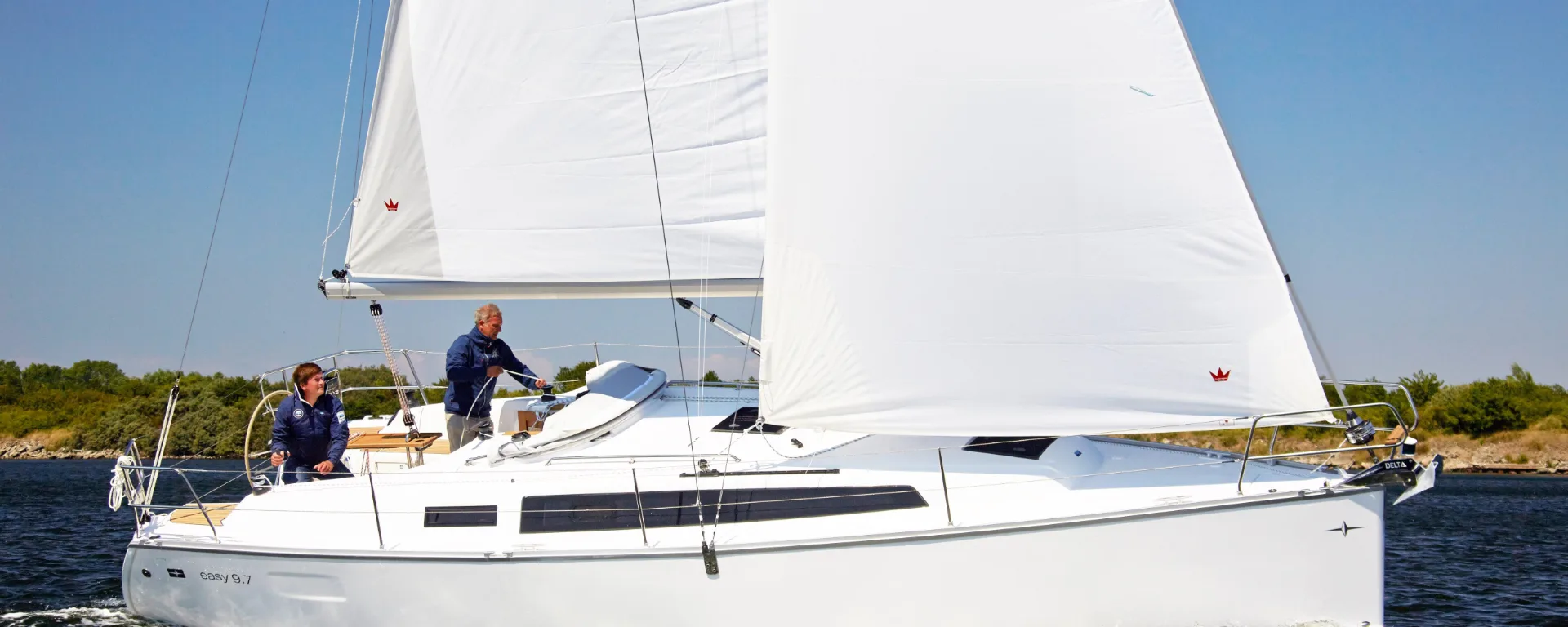 A Bavaria Easy 9.7 sailing yacht under sail