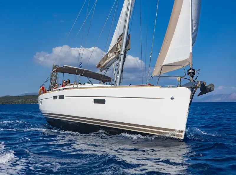 Corfu & Albania milebuilder: the Sun Odyssey 469 training yacht under full sail in the Ionian