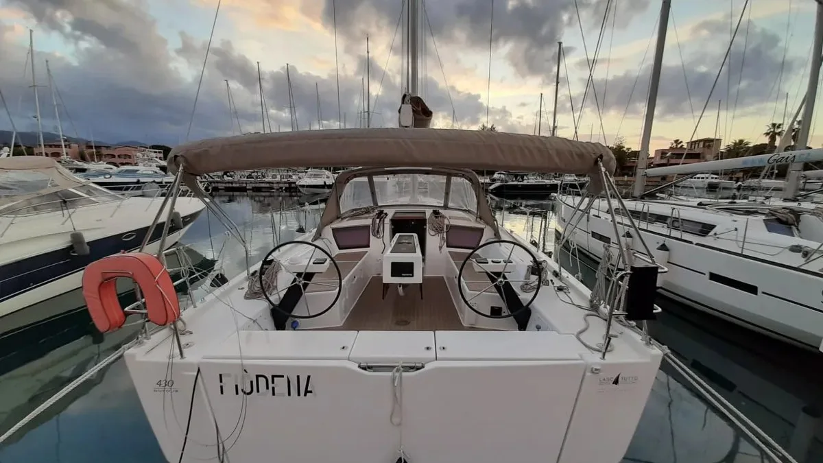 A Dufour 430 Grand Large moored in a marina