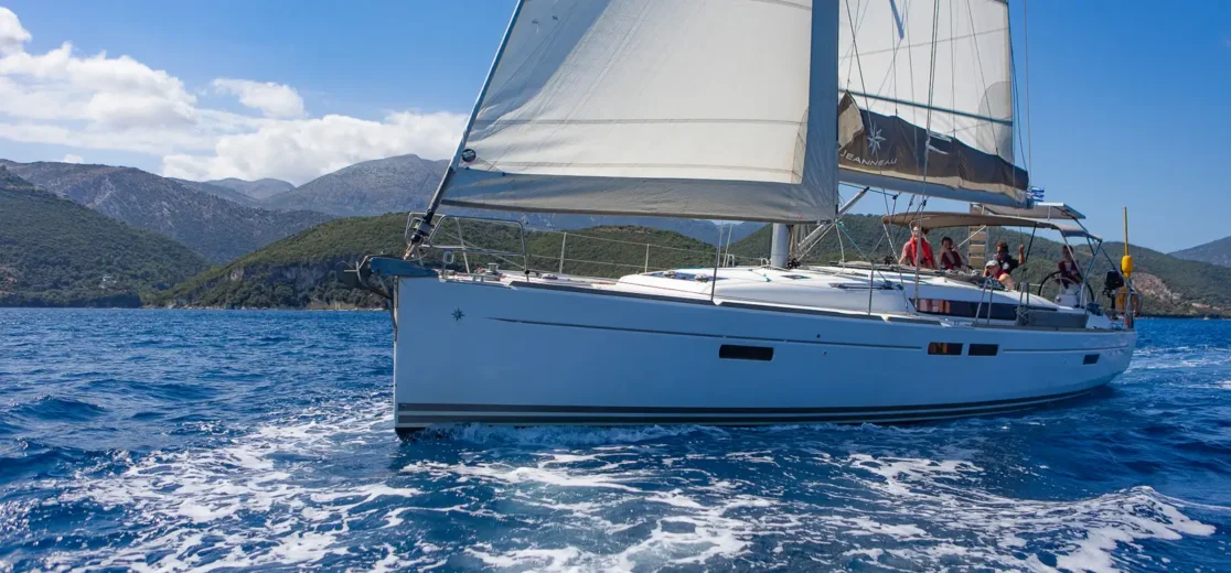 Coastal Skipper course students sailing a training yacht off the Greek coast