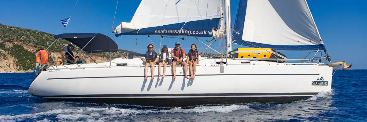 Seafarer training yacht under sail in Greece with students on deck