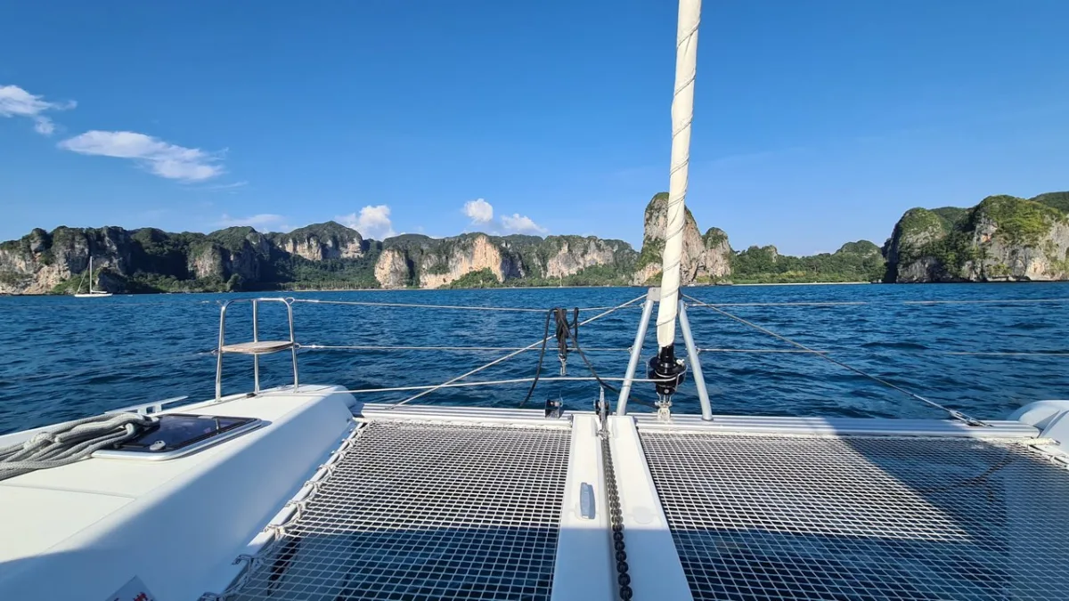 The view from the trampoline of Thai Thunder, a Lagoon 42 catamaran, in Phang Nga Bay