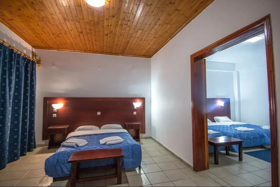 Family Sea View Room at Poseidon Beach Club: two bedrooms joined by a connecting door