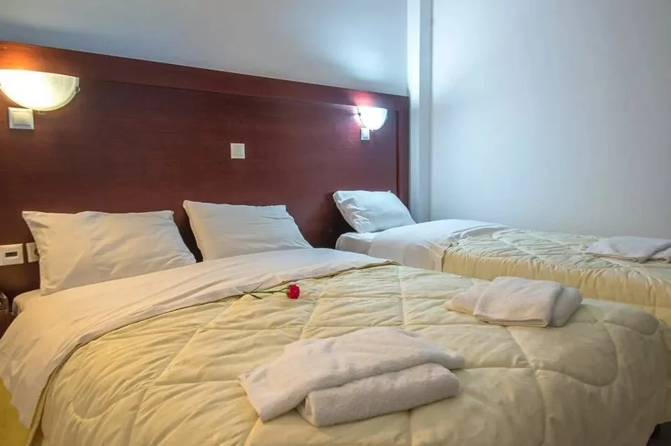 Standard Mountain View Room at Poseidon Beach Club, with a double bed and a single bed