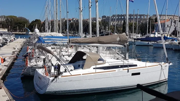 A Sun Odyssey 349 moored in a marina