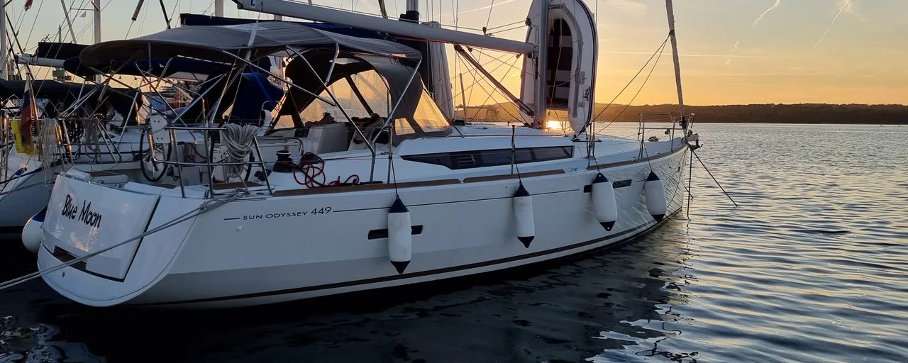 A Sun Odyssey 449 at sunset
