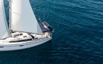 Sailing yacht under full sail on open water in Greece