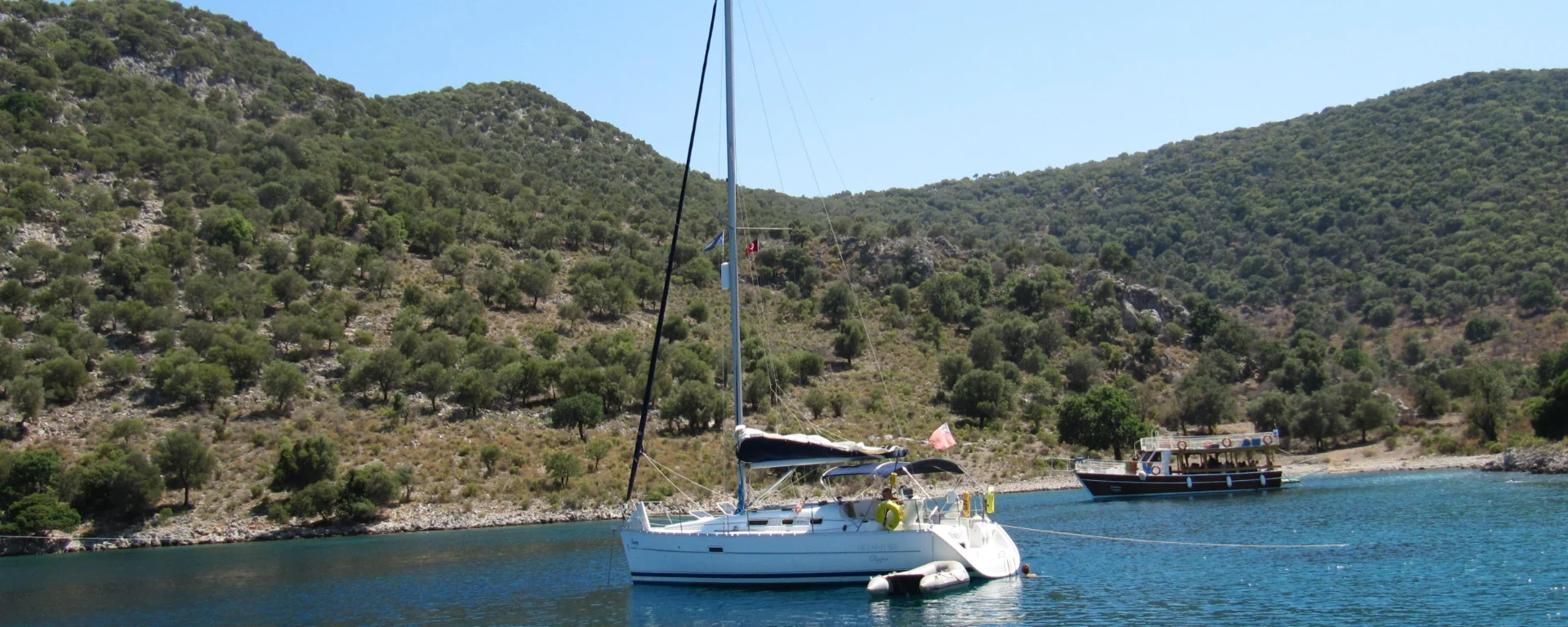 The Oceanis 323 at anchor in a quiet bay on the Turkish coast